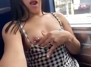 Latina masturbates and cums on the bus