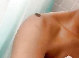 Black brace-face in shower 
