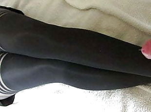 Thick cum on her nylon legs, tights layered over stockings