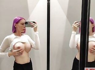 Try on haul transparent clothes in the fitting room. Busty blonde tries on a transparent blouse in o