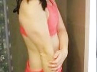 Sexy muscular asian crossdresser Regina Tifa in pink dancing, flexing and posing and teasing nipples