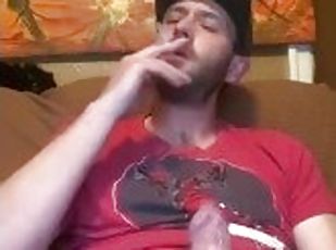 Cum in condom while smoking solo, dripping cum over cock