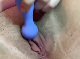 Vibrating my unshaven pussy while my family is in the living room