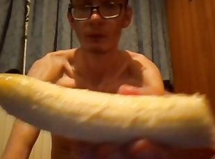 Skinny horny guy cums on a banana and eats it with the cum