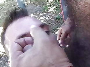 Tattooed stud blows big dick outdoor for huge cum eating