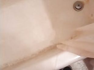 Pissing in my shower in my upstairs bathroom and fondling my dick and balls)