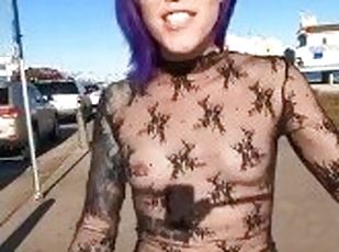 See through top on busy beach street tits on display