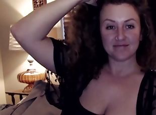 Brunette with big boobs masturbates on webcam