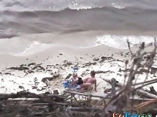 Couple fucking on the beach