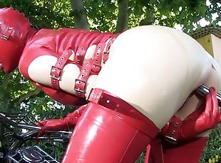 Lucy rocks the show in her red latex outfit