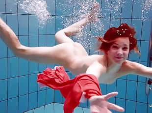 Red Long Dress And Big Tits Floating In The Pool