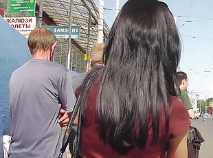 Brunette girls in Jeans are filmed upskirt in the street