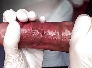 Super close-up handjob in white latex gloves with commentary. Alternative view