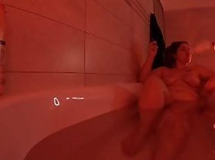 Smoking while taking a bath in sexy red light