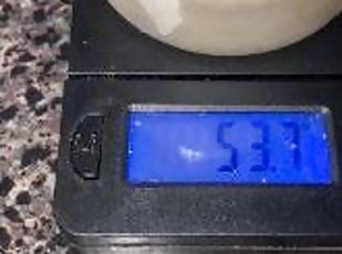 A couple ounces of my cum!!!! Weighing my frozen cum loads on a scale-53.7grams